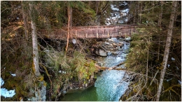 Ennstal Mitte, Gemeinde Sölk, Strub, Kleinsölk, Großsölk, Frühling, alle Bilder, Brücke, Schnee, Wald, Baum, Weg, Wasser, Bach, Luftaufnahme, Paradies Ennstal, Thomas Hofer, Landschaftsfoto, Landschaftsbild, Landschaftsaufnahme, Foto, Bild, Aufnahme, Ennstal, Luftbild, Luftaufnahme, Drohnenfoto, Panoramabild, Panoramafoto, 360 Grad, Imagetrailer, Strub_2697